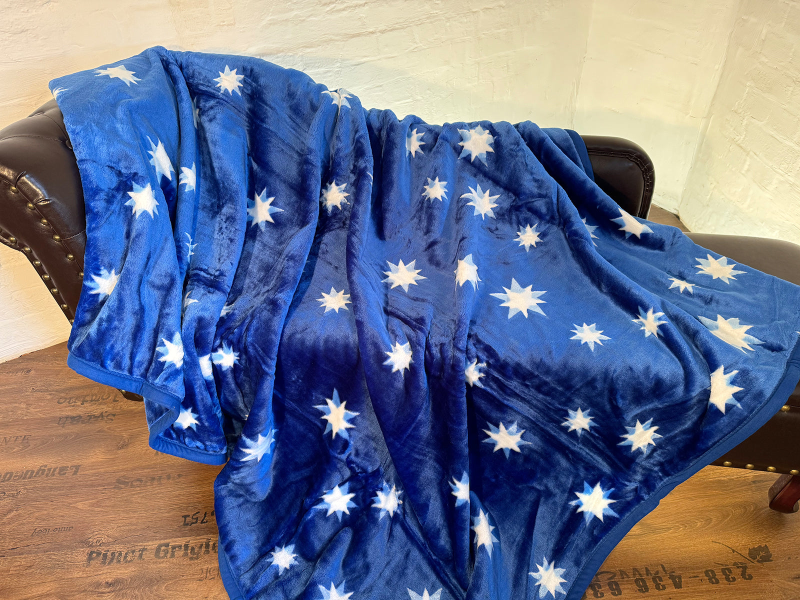 Kuscheldecke Tagesdecke Wohndecke Motiv Sterne blau